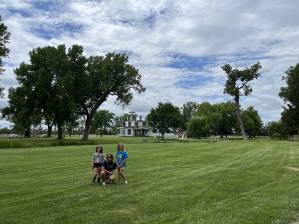 Zoey and her two cousins in front of Buffalo Bill's Ranch in Paxton, Nebraska. 