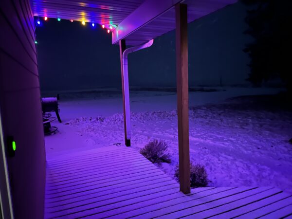 Just this morning, the deck was clear. The snowy mix is coming down now, as Paul is making his way home from Nebraska. 